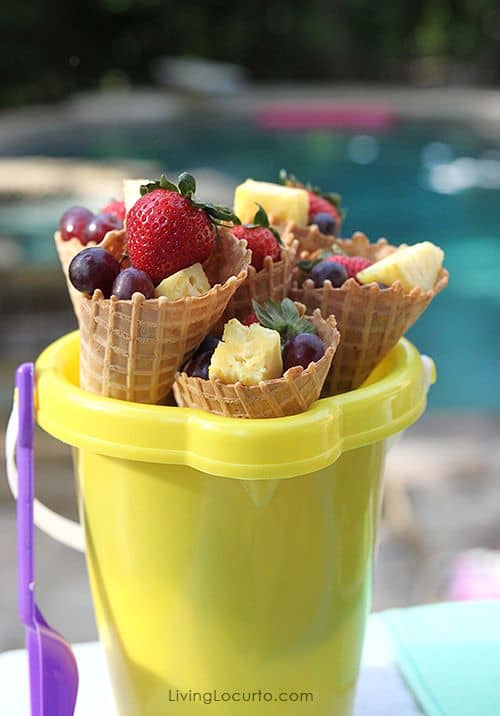 Pool party ideas! Fruit in waffle cones. 