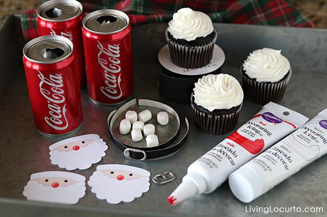 Santa Cupcakes made with Mini Coke Cans. An adorable Christmas fun food party craft idea! Easy holiday dessert idea for kids.