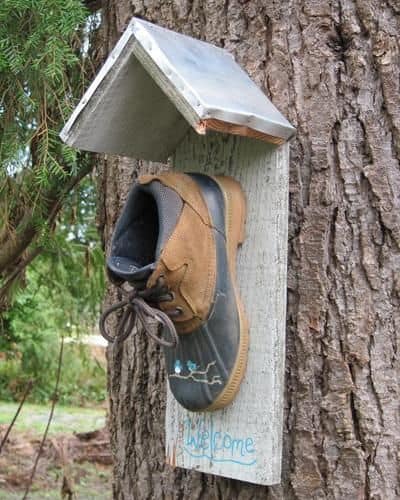 Repurposed Boot Bird House - Creative ways to add color and joy to a garden, porch, or yard with DIY Yard Art and Garden Ideas! Repurposed ideas for the backyard. Fun ideas for flower gardens made from logs, bikes, toys, tires and other old junk. ~ featured at LivingLocurto.com