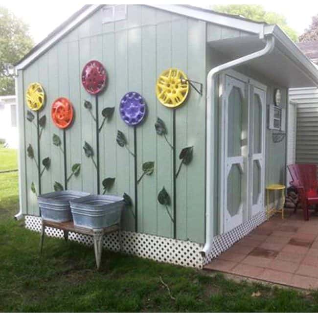 A DIY Hubcap Flower Garden can brighten up any yard!