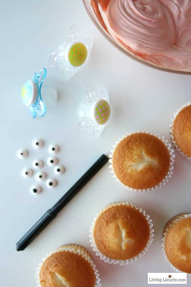 Baby Shower Party Ideas and how to make adorable Baby Pacifier Cupcakes. LivingLocurto.com Baby Shower Party Ideas and how to make adorable Baby Pacifier Cupcakes. LivingLocurto.com
