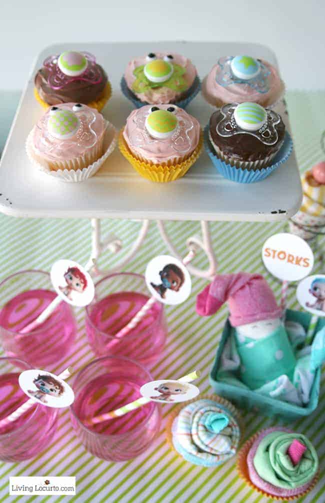 Easy Baby Shower Party Ideas and how to make adorable Baby Pacifier Cupcakes. Free printables and diaper cake inspiration. LivingLocurto.com Easy Baby Shower Party Ideas and how to make adorable Baby Pacifier Cupcakes. Free printables and diaper cake inspiration. LivingLocurto.com