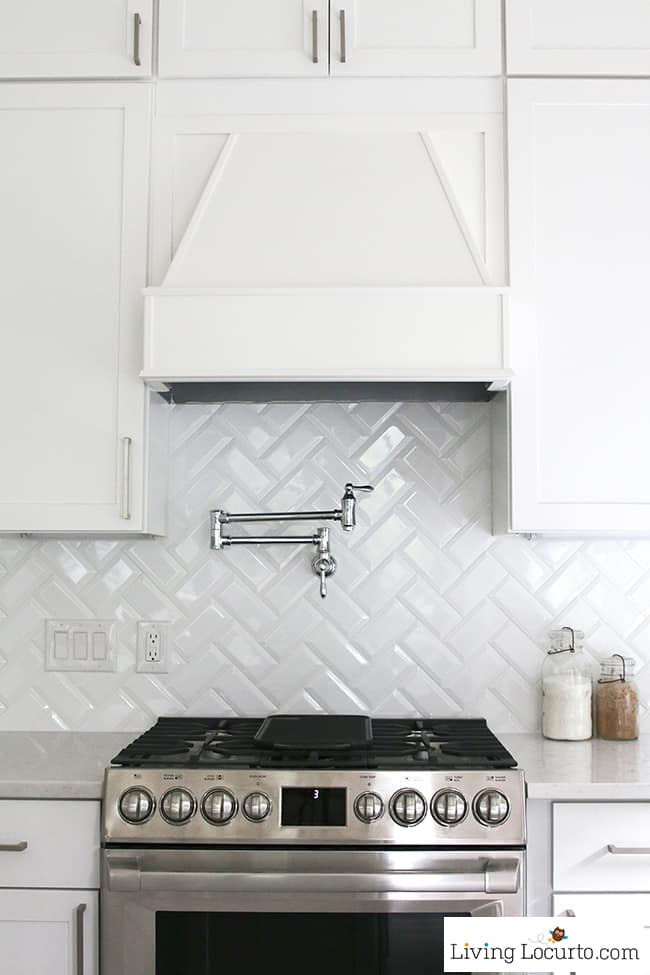 New White Kitchen Reveal. Amazing before and after photos of a modern farmhouse style kitchen home remodel. Home decorating and kitchen inspiration. Pot Filler and Kenmore Pro Range. LivingLocurto.com