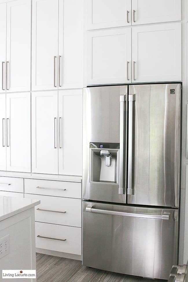 New White Kitchen Reveal. Amazing before and after photos of a modern farmhouse style kitchen home remodel. Home decorating and kitchen inspiration. Kenmore Pro Refrigerator. LivingLocurto.com