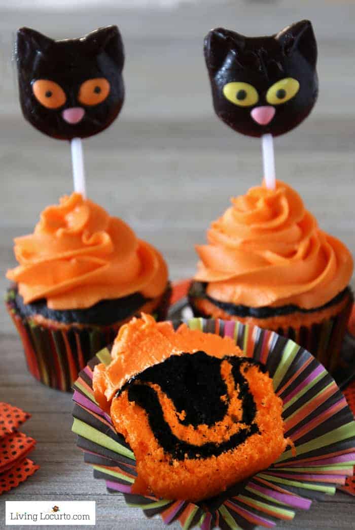 How to make orange and black tie dye Halloween cupcakes with black cat lollipops.