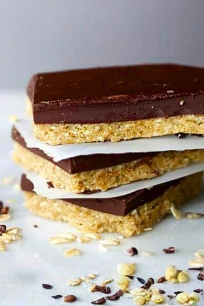 These easy no-bake homemade chocolate protein bars are the perfect treat. They’re gluten free and packed with protein and calcium. All of the great taste you love without the guilt!