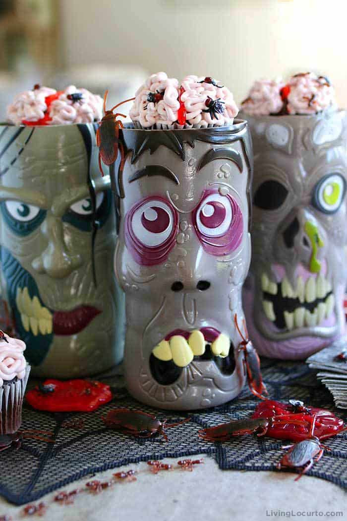 You'll die over these creepy Brain Cupcakes covered in bugs! Easy Halloween party recipe, just add to zombie cups for a creepy Halloween dessert table.