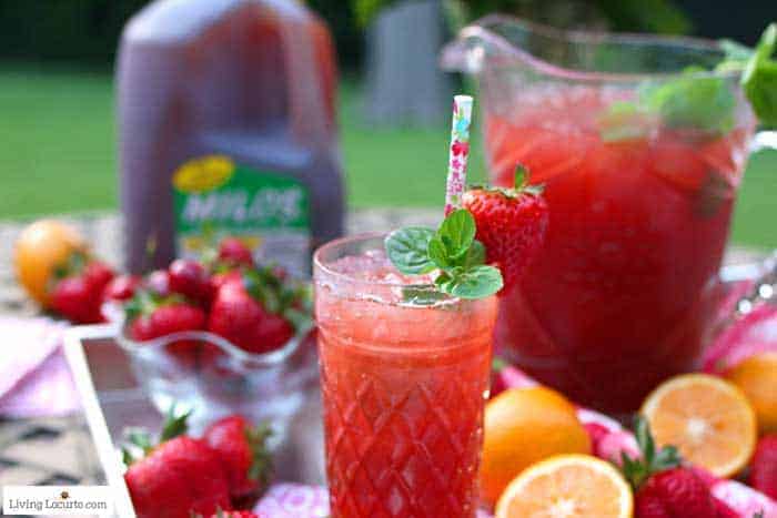 Strawberry Iced Tea made by the pitcher with fresh strawberries, mint, lemons and Milo&rsquo;s Famous Iced Tea.