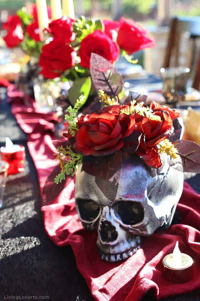 Skull Vase with Roses - Halloween Party Ideas for a Witch's Night Out! Inspiration for hosting an epic gothic Witch Halloween Party. 
