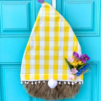 Spring Gnome Door Hanger with yellow and white check material and flowers