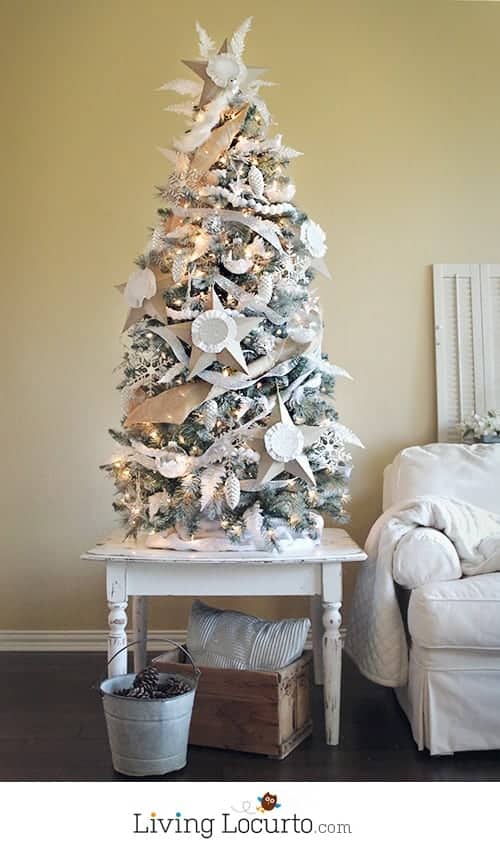How to paint an artificial Christmas tree white. A painted white Christmas tree and homemade ornaments are easy holiday home decor crafts!