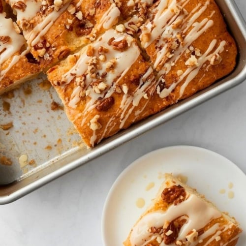 Sweet Cinnamon Focaccia bread in a baking pan and cut into squares