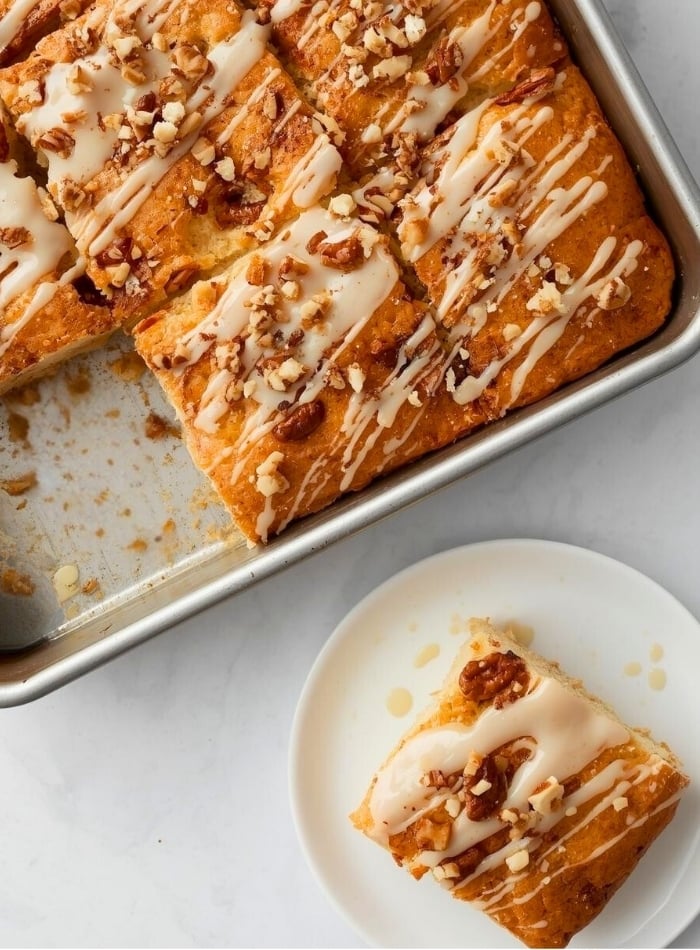 Sweet Cinnamon Focaccia bread in a baking pan and cut into squares