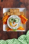 Vegetable Dip Recipe shaped to look like a scarecrow.