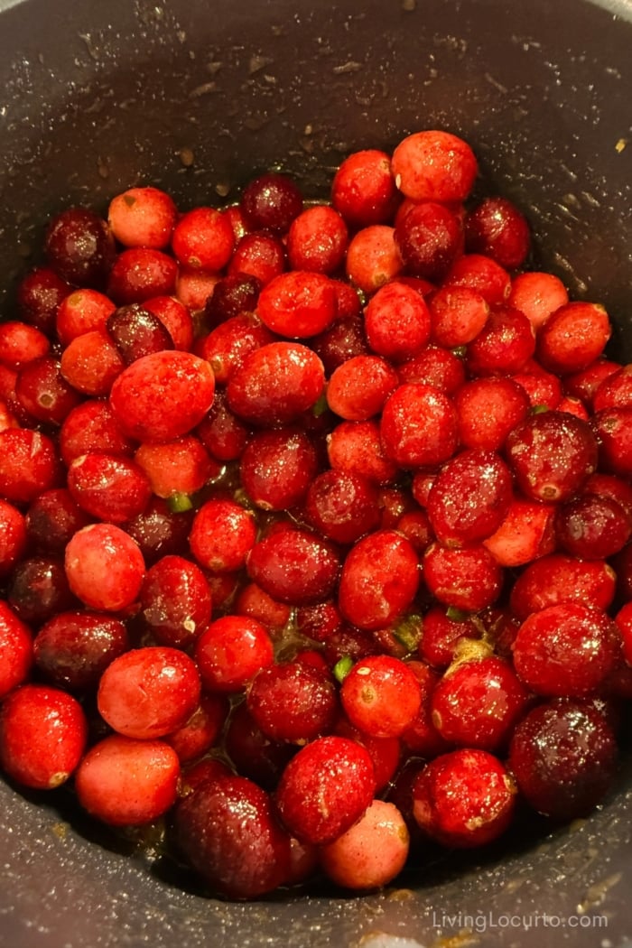 This homemade cranberry sauce is sweet, slightly spicy, and made with orange and optional jalape&ntilde;o. Perfect for Thanksgiving, Christmas, and holiday entertaining.