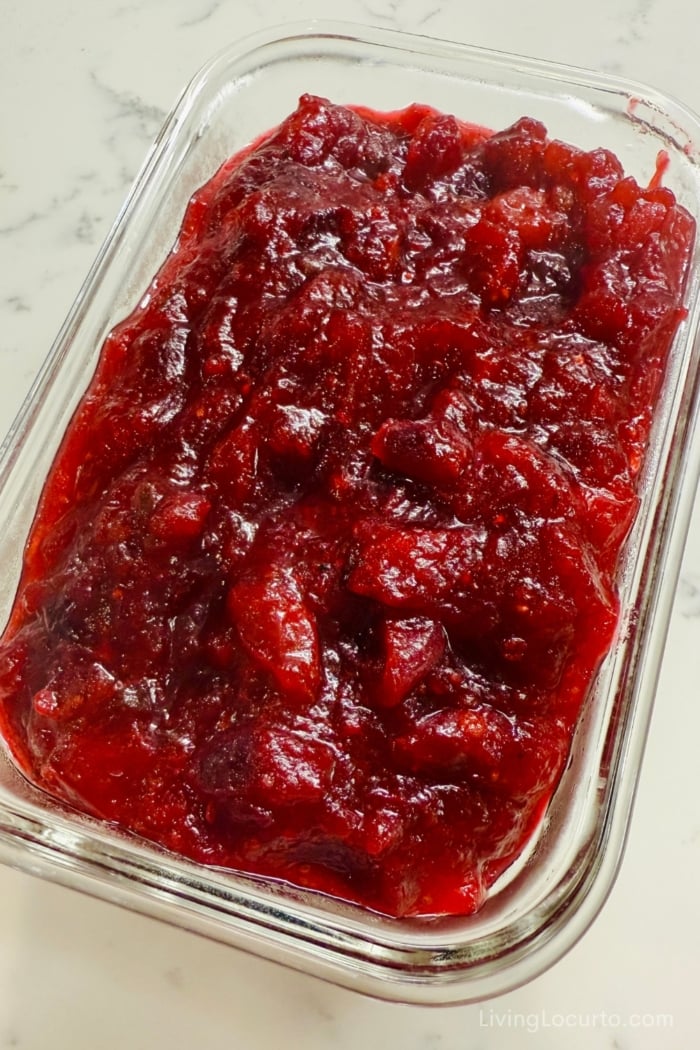 Hot Honey Whipped Goat Cheese Dip with Cranberry & Walnuts 3 cranberry sauce in a glass dish