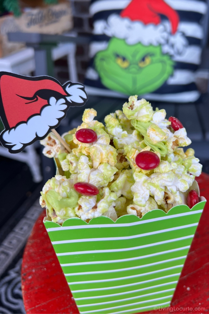 An easy no-bake holiday snack made with popcorn, green candy melts, and red candies. Perfect for Grinch-themed Christmas parties and festive movie nights.