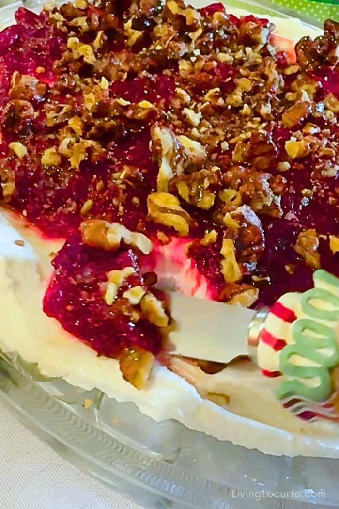 Hot Honey Whipped Goat Cheese Dip with Cranberry & Walnuts 4 Whipped Goat Cheese Dip Recipe being scooped out of plate with a knife.