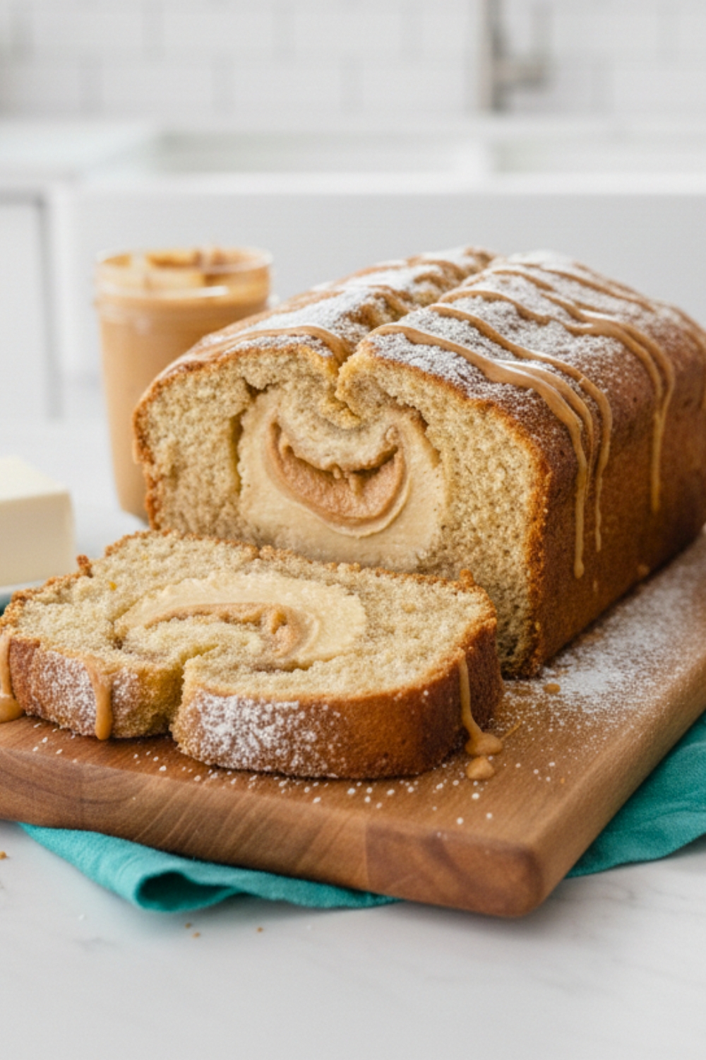 Peanut Butter Cream Cheese Filled Banana Bread - Moist, easy-to-make banana bread with a rich, velvety peanut butter cheesecake swirl.