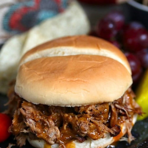 Instant Pot Pulled Pork sandwich on a plate.