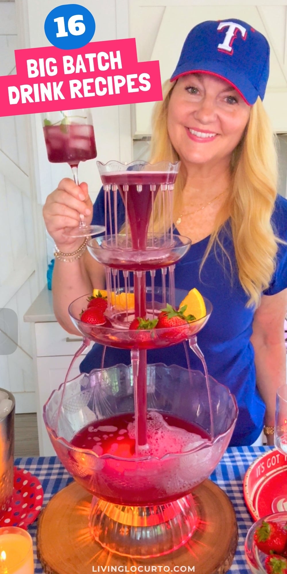 Women holding drink next to tall drink fountain
