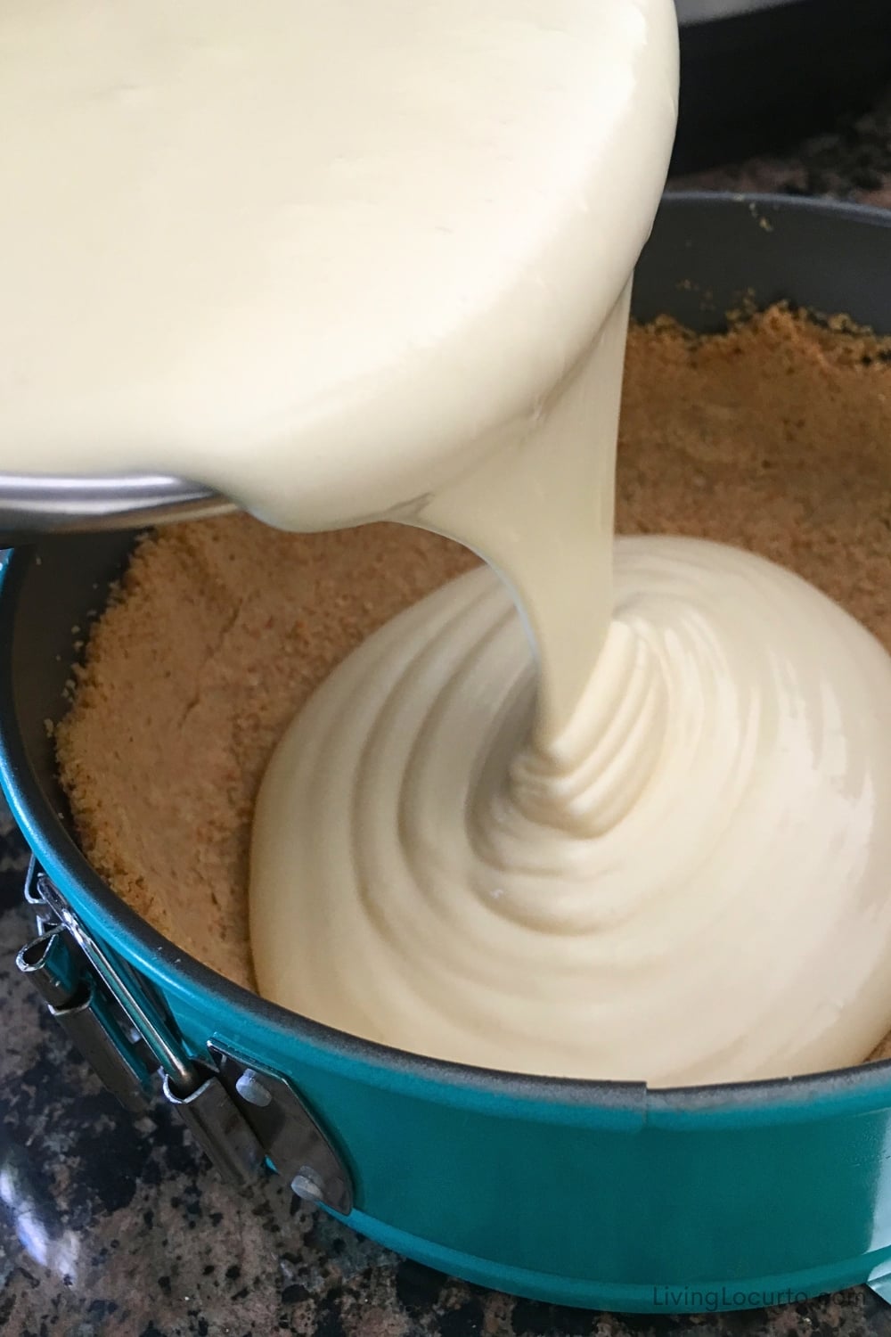 Copycat Cheesecake Factory Cheesecake 9 Pouring cheesecake mix into a pan