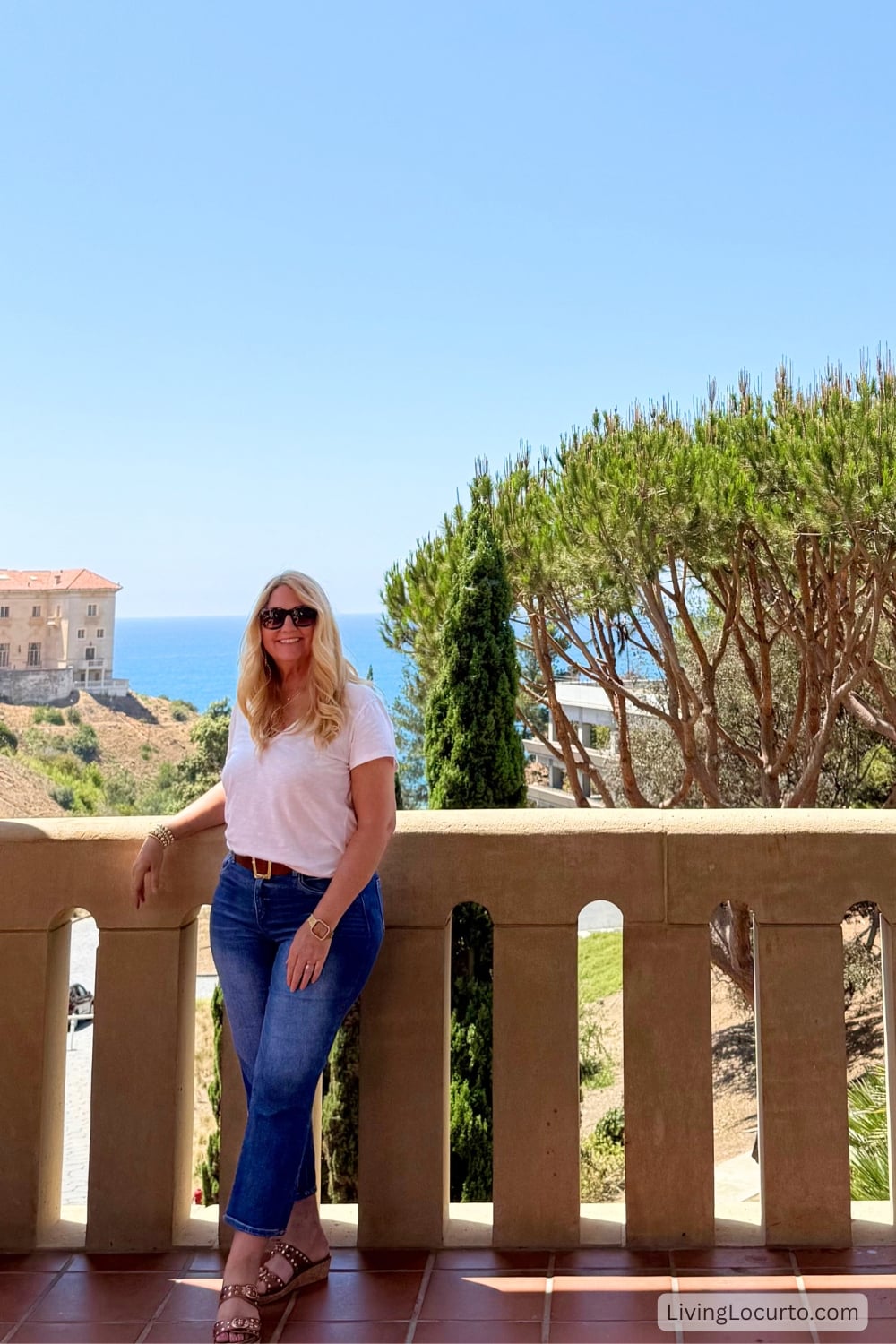 3 Days in Los Angeles - The Ultimate Itinerary 11 woman standing on patio with ocean in background.