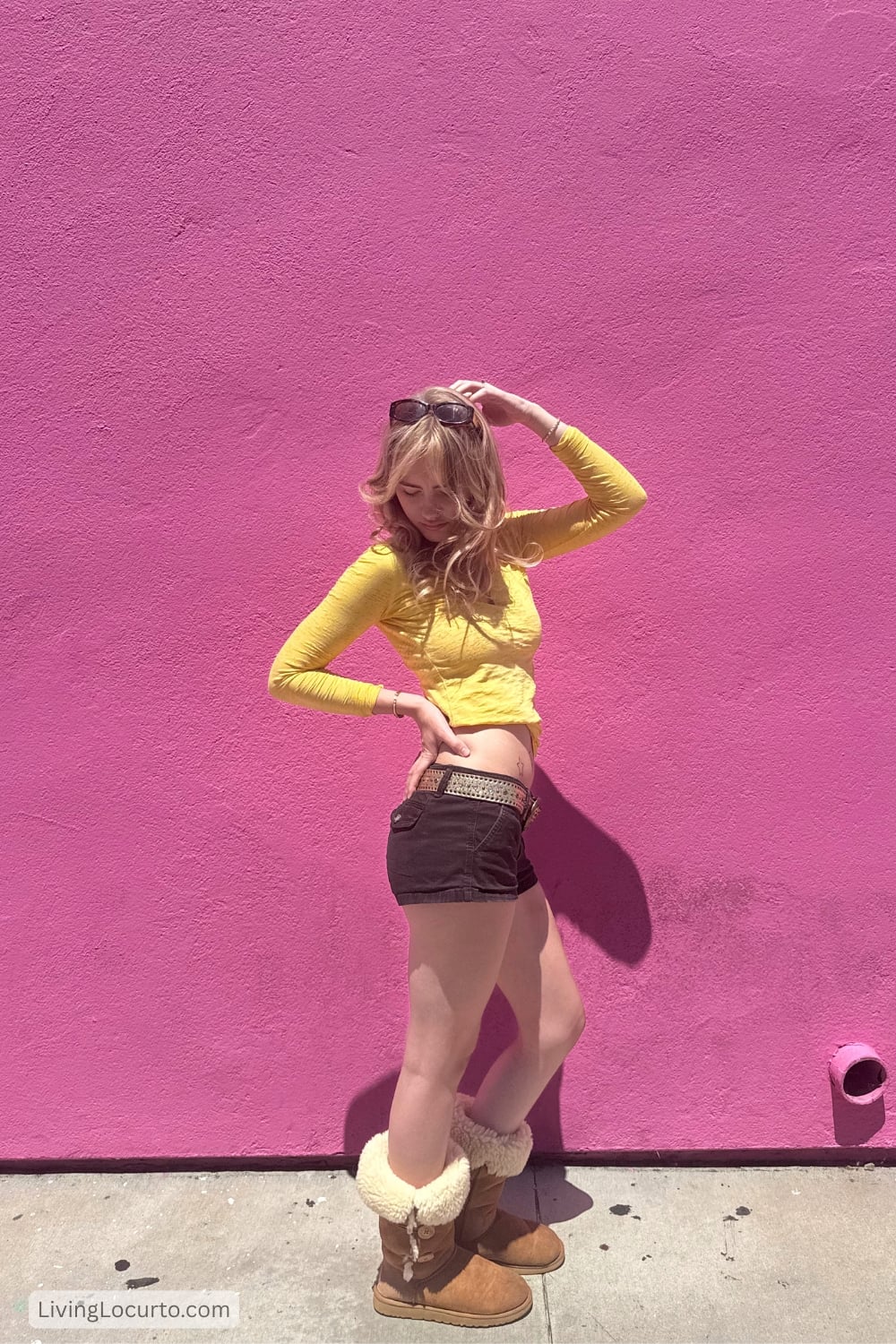 3 Days in Los Angeles - The Ultimate Itinerary 6 Girl in yellow shirt with Pink Wall backdrop