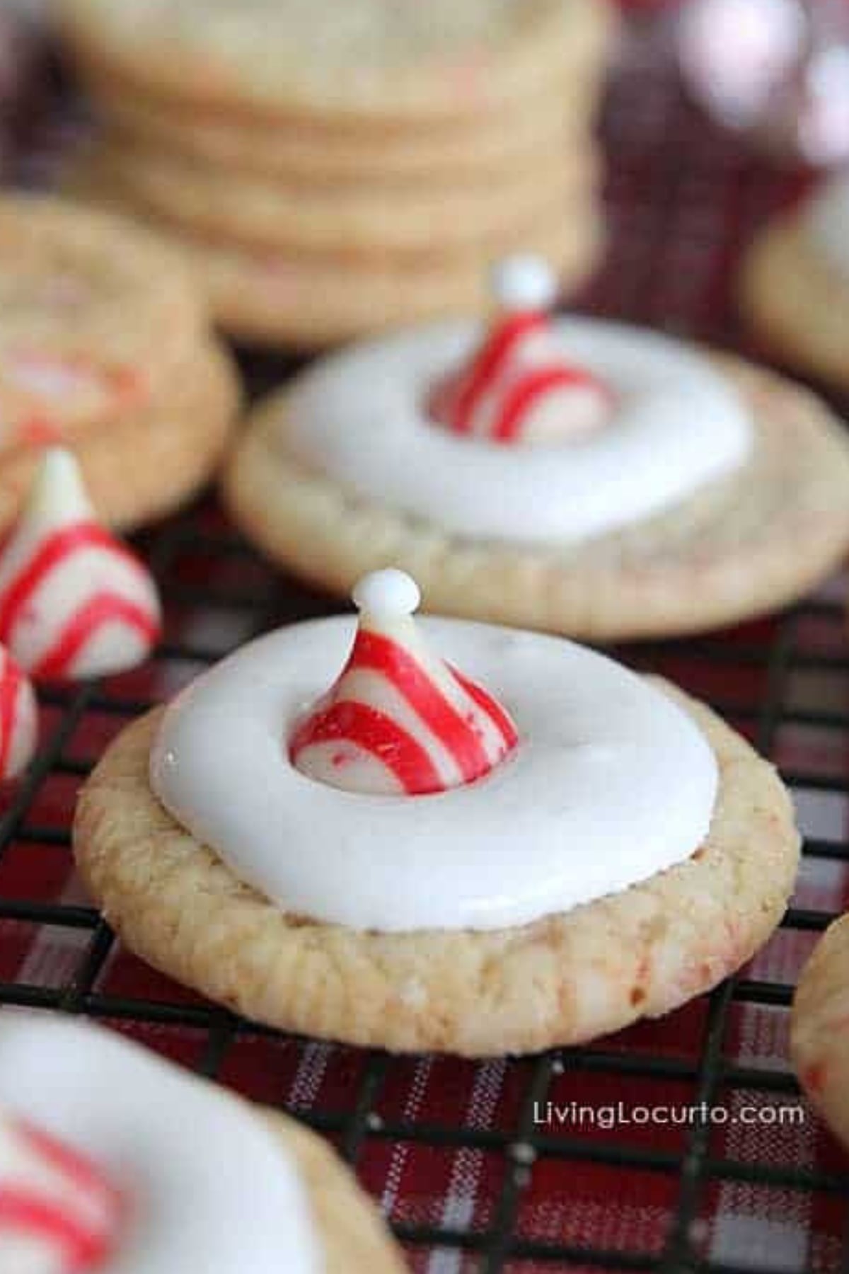 Sugar cookies with a peppermint candy kiss to look like a santa hat.